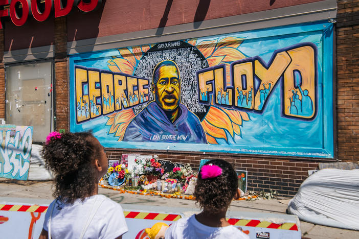 A mural of George Floyd at the intersection where he was murdered in Minneapolis, Minn.