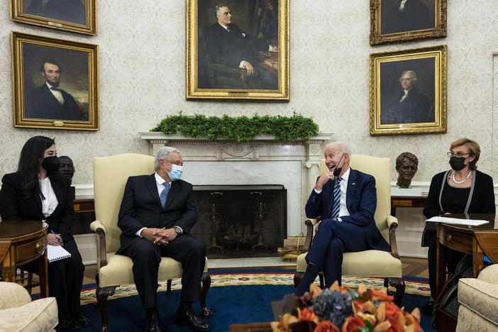 U.S. President Joe Biden, second from right, meets with Mexican President Andres Manuel Lopez Obrador, second from left, in the Oval Office of the White House on Nov. 18, 2021.