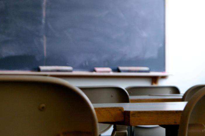 A South Florida school district says it's launching an investigation after a photo showing students spelling out a racial slur was shared online.