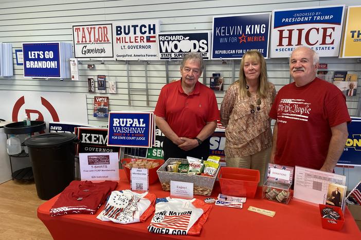 Joe Marinich (right), the Republican chairman of Forsyth County, Ga., poses at the party headquarters with Bea Wilson and Ed Murray, two recently trained poll watchers.