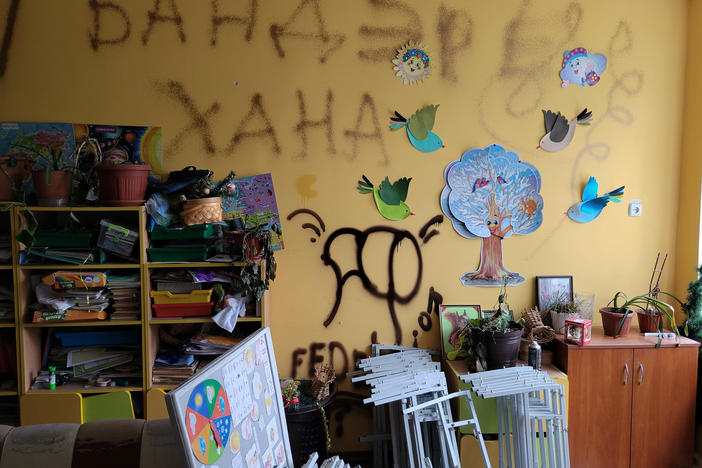 Russian soldiers left graffiti in the school in Borodyanka, a town outside of Ukraine's capital Kyiv.