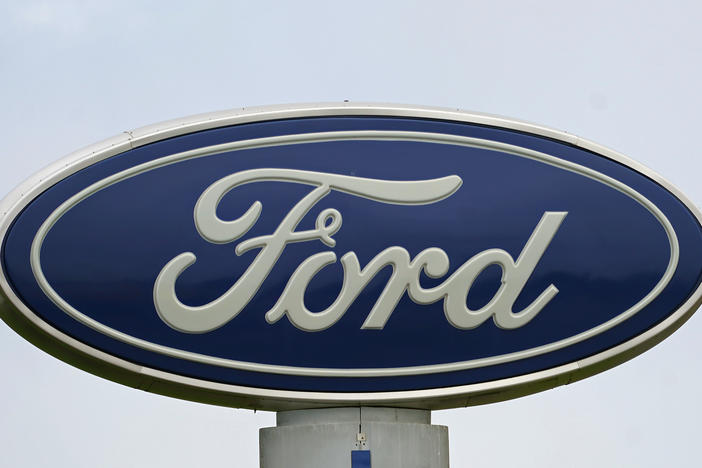 A Ford logo is seen on a sign at Country Ford in Graham, N.C. The auto manufacturer has issued a recall that affects about 39,000 SUVs.