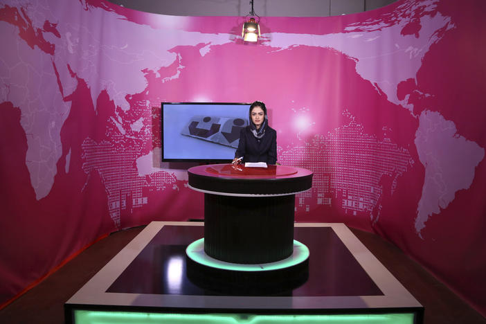 Basira Joya, 20, a news presenter, sits during recording at the Zan TV station (women's TV) in Kabul, Afghanistan, on May 30, 2017. Afghanistan's Taliban rulers ordered all female TV presenters to cover their faces on air, the country's biggest media outlet said on Thursday.