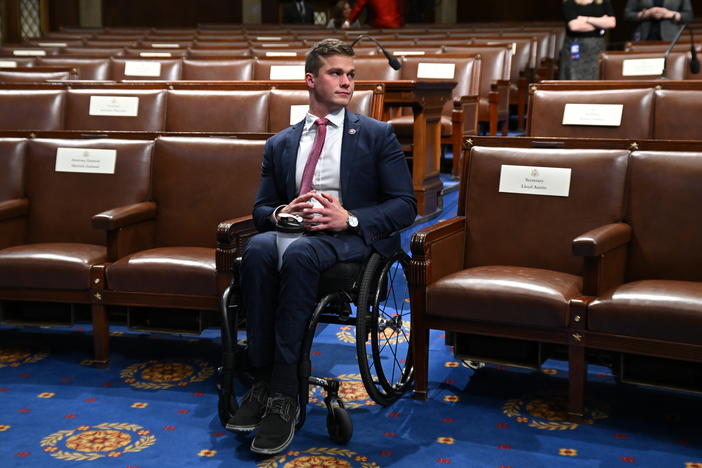 Rep. Madison Cawthorn, R-N.C., seen here waiting for the State of the Union address in March, faces allegations of insider trading related to an anti-Biden cryptocurrency and of having an inappropriate financial relationship with a staffer.