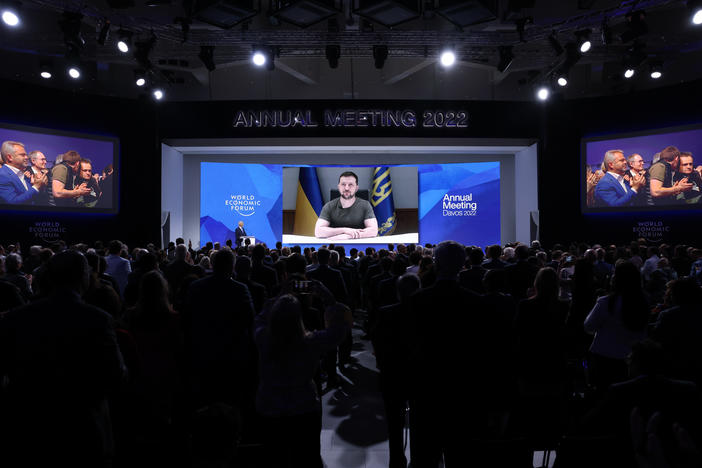 Ukrainian President Volodymyr Zelenskyy receives a standing ovation after his video address on the first day of the World Economic Forum in Davos, Switzerland, on Monday.