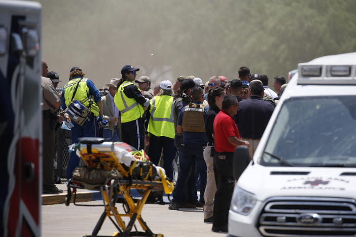Emergency personnel gather near Robb Elementary School following a shooting Tuesday in Uvalde, Texas. Nineteen children and two adults were shot and killed.