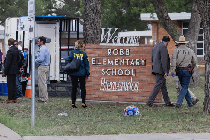 Law enforcement work the scene on Tuesday after a mass shooting at Robb Elementary School in Uvalde, Texas.