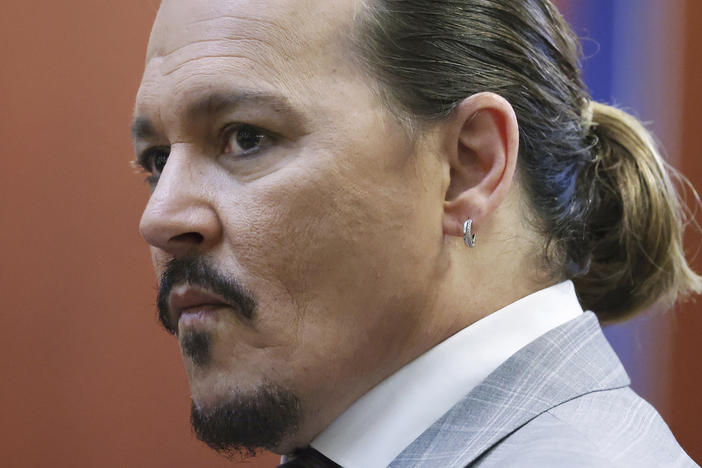 Actor Johnny Depp arrives in the courtroom at Fairfax County Circuit Court in Fairfax, Va., on Thursday.