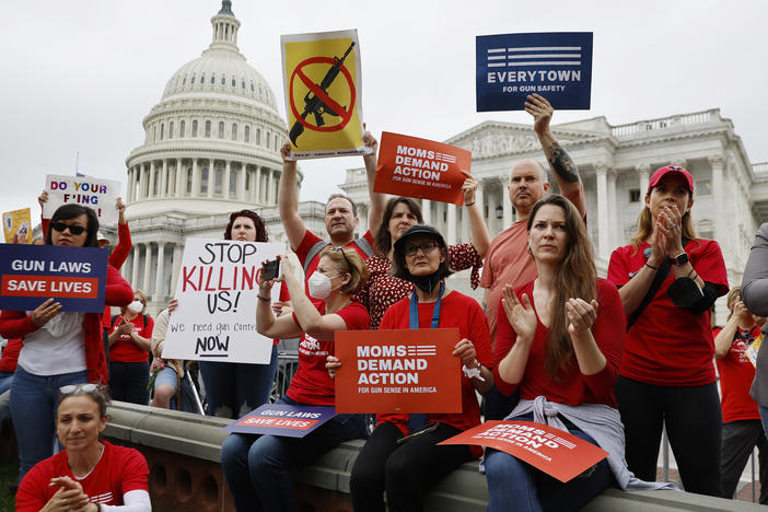 Gun control advocacy groups rally with Democratic members of Congress outside the U.S. Capitol on Thursday. Organized by Moms Demand Action, Everytown for Gun Safety and Students Demand Action, the rally brought together members of Congress and gun violence survivors to demand gun safety legislation following mass shootings in Buffalo, N.Y., and Uvalde, Texas.