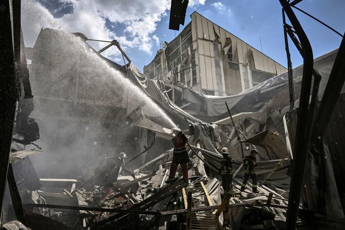 Firemen extinguish a fire at a gypsum manufacturing plant after shelling in the city of Bakhmut, in the eastern Ukrainian region of Donbas, on Friday. Russia pressed on with a deadly offensive to capture key points in the Donbas this week.