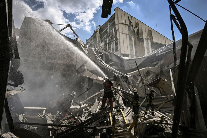 Firemen extinguish a fire at a gypsum manufacturing plant after shelling in the city of Bakhmut, in the eastern Ukrainian region of Donbas, on Friday. Russia pressed on with a deadly offensive to capture key points in the Donbas this week.