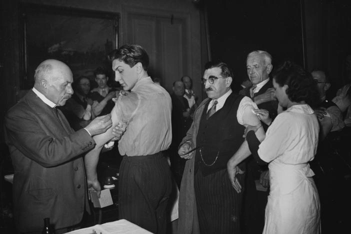 Smallpox vaccines being administered in Paris in 1941. When the disease was eradicated and vaccination came to a stop, that created an opening for its virus relative monkeypox.