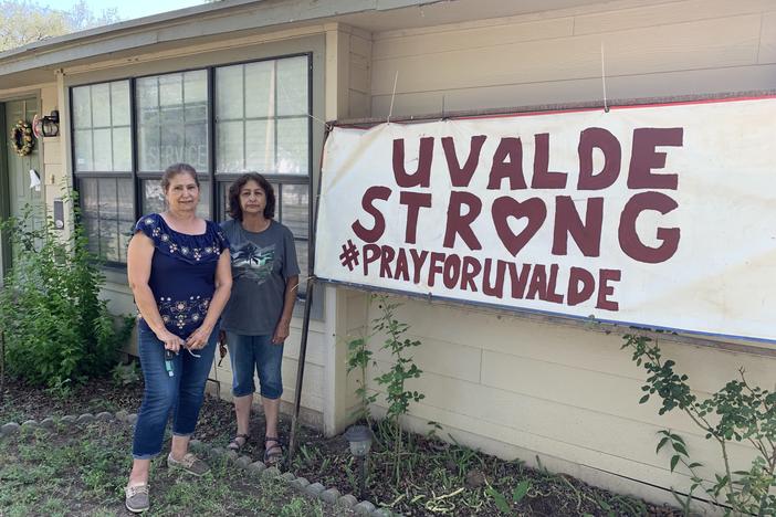 Romie Perez and Elia Zamarripa at Perez's house. The two are among the many holding impromptu cookouts to make meals for the families of the victims.