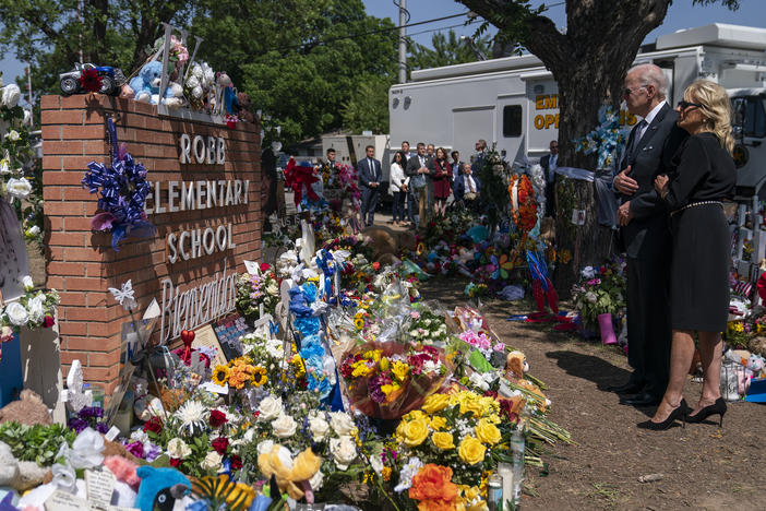 President Joe Biden and First Lady Jill Biden visit a memorial at Robb Elementary School to pay their respects to the victims of the mass shooting, Sunday, May 29, 2022, in Uvalde, Texas.