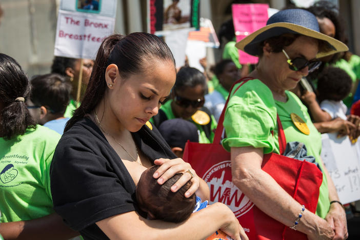 The baby-formula shortage has led some to question why the U.S. doesn't provide more support for breastfeeding. Here, a woman breastfeeds her son outside New York City Hall during a 2014 rally to support breastfeeding in public.