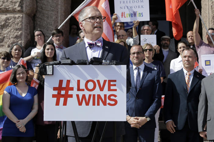 Jim Obergefell, the named plaintiff in the <em>Obergefell v. Hodges</em> Supreme Court case that legalized same-sex marriage, stands at the Texas Capitol during a rally on June 29, 2015.