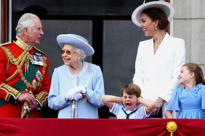 Britain's Queen Elizabeth II, Prince Charles and Catherine, Duchess of Cambridge, along with Princess Charlotte and Prince Louis appear on the balcony of Buckingham Palace as part of the Trooping the Color parade during the queen's Platinum Jubilee celebrations.