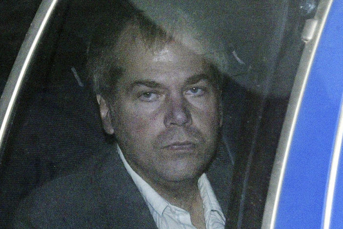 John Hinckley arrives at U.S. District Court in Washington in 2003. A judge said Hinckley's release from conditions would occur as planned June 15.