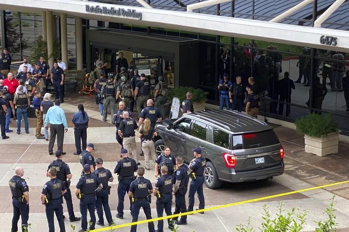 Emergency personnel respond to a shooting at the Natalie Medical Building on Wednesday in Tulsa, Okla.