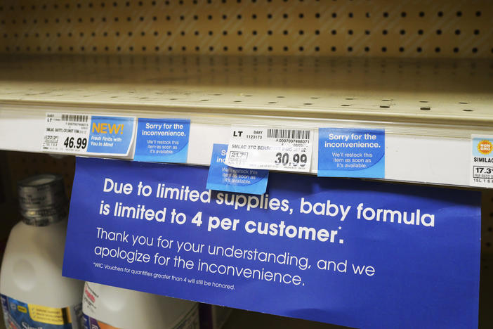 A sign limiting baby formula purchases is seen on a shelf at a grocery store in Salt Lake City.