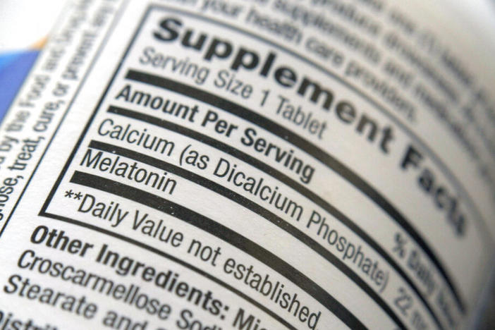 The label for a bottle of melatonin pills. Melatonin is a hormone that helps control the body's sleep cycle.