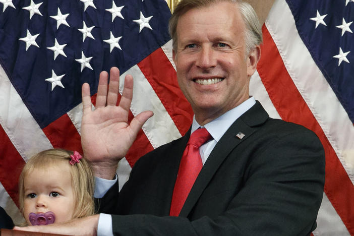 Congressman Chris Jacobs, R-N.Y., poses for a photo with his daughter Anna, 1, during a ceremonial swearing-in on Capitol Hill, on July 21, 2020, in Washington. Jacobs says he will not run for another term in Congress amid backlash over his support for new gun control measures.