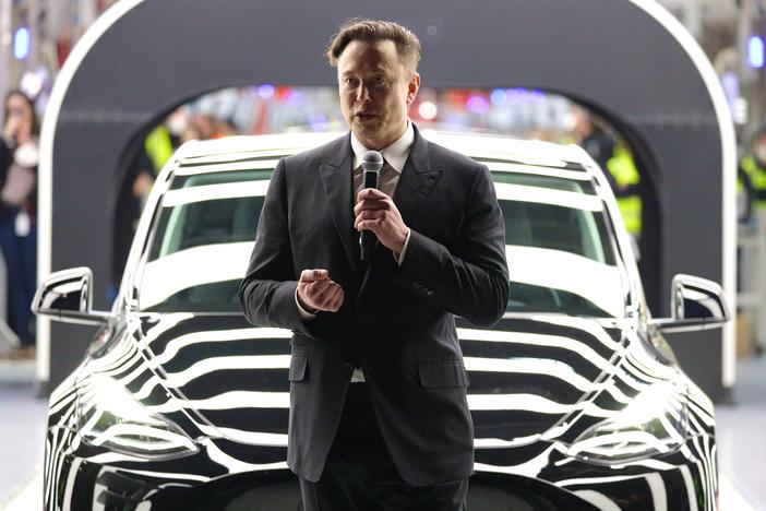 Tesla CEO Elon Musk speaks during the official opening of the new Tesla electric car manufacturing plant near Gruenheide, Germany, on March 22. Musk reportedly wants to lay off 10% of staff because of his worries about the economy.