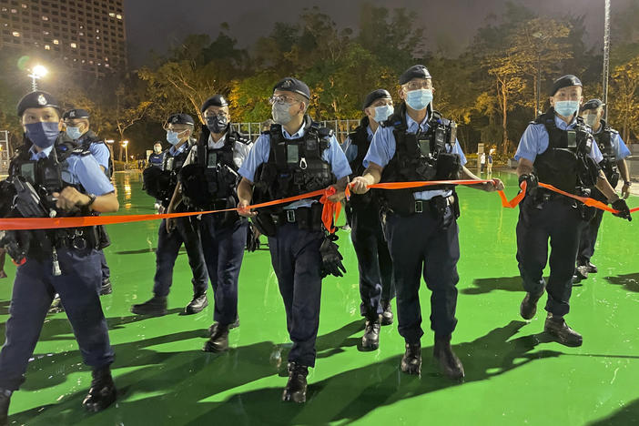 Police officers on Friday set up a cordon as Hong Kong authorities announced a temporary closure of the Victoria Park where the candlelight vigil used to be held to commemorate the June 4, 1989 military crackdown in Beijing's Tiananmen Square on a pro-democracy student movement.