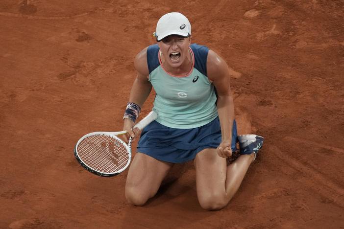Poland's Iga Swiatek reacts as she defeats Coco Gauff of the U.S. during the women's final of the French Open in Paris on Saturday. Swiatek won 6-1, 6-3.