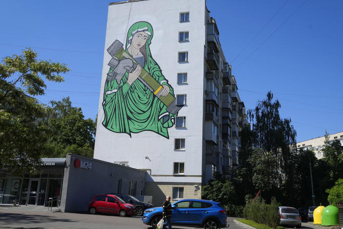 A mural on a wall in Kyiv on Monday depicts an image of "Saint Javelina" — the Virgin Mary cradling a U.S.-made Javelin. These missiles are among the weapons sent by Western allies to Ukrainian forces to aid in their fight against Russia. The Javelin is widely considered a symbol of Ukraine's defense.