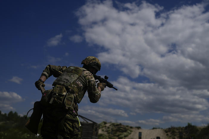 A civilian militia member holds a rifle during training at a shooting range on the outskirts of Kyiv on Tuesday.