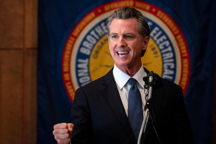 California Gov. Gavin Newsom stops at IBEW Local 6 union hall in San Francisco on Sept. 14, 2021, to speak with union workers and volunteers.