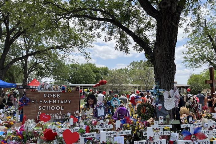 The trees that George Garza planted as a new teacher in the 1960s today offer shade at the memorial to the victims of the mass shooting at Robb Elementary School in Uvalde, Texas.
