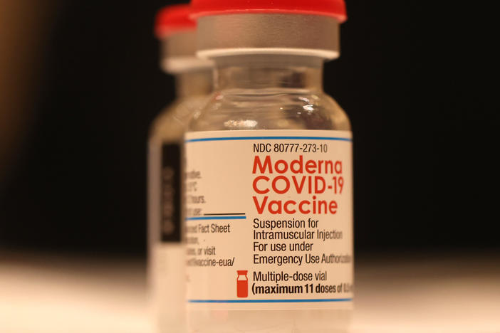 Moderna says its new bivalent vaccine is its "lead candidate for a Fall 2022 booster." Here, a vial of the company's COVID-19 vaccine sits on a table at a vaccination clinic in San Rafael, California.