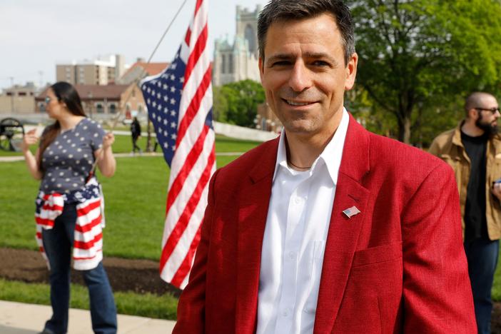 Ryan Kelly, a Republican candidate for governor, attends a rally in support of First Amendment rights and to protest against Gov. Gretchen Whitmer, outside the Michigan State Capitol in Lansing, Mich., on May 15, 2021.