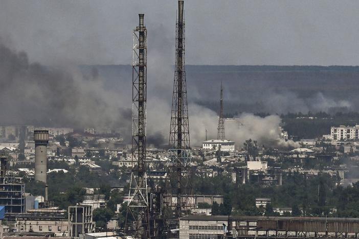 Black smoke and soot rise from the city of Sievierodonetsk, eastern Ukraine, during a battle between Russian and Ukrainian troops on Thursday. Ukraine's leader has called it the epicenter of the fight for the Donbas region.