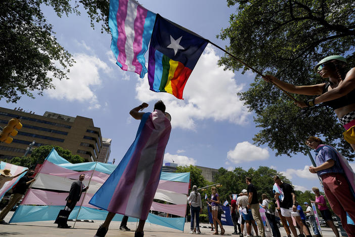 Demonstrators gather on the steps to the state Capitol to speak against transgender-related legislation bills being considered in the Texas Senate and Texas House on May 20, 2021 in Austin, Texas.