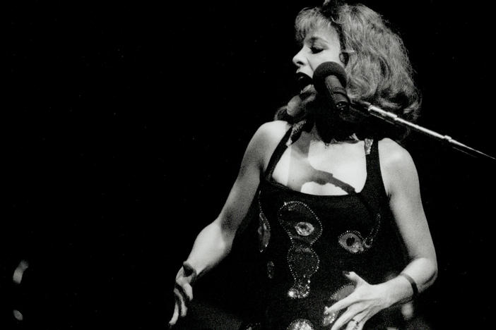 In the '90s, Julee Cruise filled in for The B-52s member Cindy Wilson on tour. The singer is best known for her work with David Lynch on <em>Twin Peaks</em> and <em>Blue Velvet</em>.