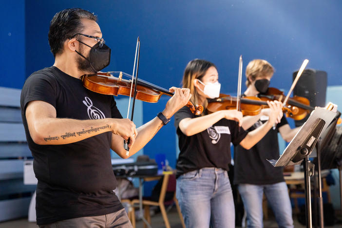 Vijay Gupta performing with some of the professional musicians in Street Symphony at the Midnight Mission on LA's Skid Row.
