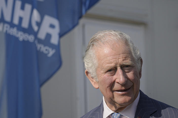 Britain's Prince Charles arrives at a center for refugees fleeing the war in neighboring Ukraine, inside the Romexpo convention center, in Bucharest, Romania, May 25, 2022.