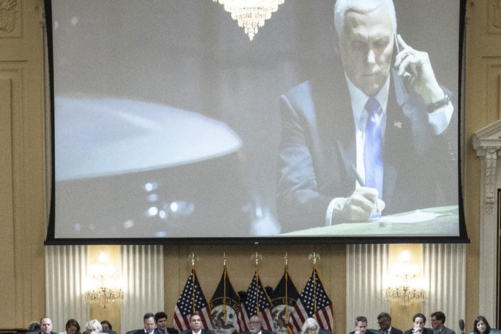 A committee exhibit shows former Vice President Mike Pence on the phone from his secure location during the riot, as the House select committee investigating the Jan. 6, 2021, attack on the Capitol holds a hearing in Washington, Thursday, June 16, 2022. (Drew Angerer/Pool Photo via AP)