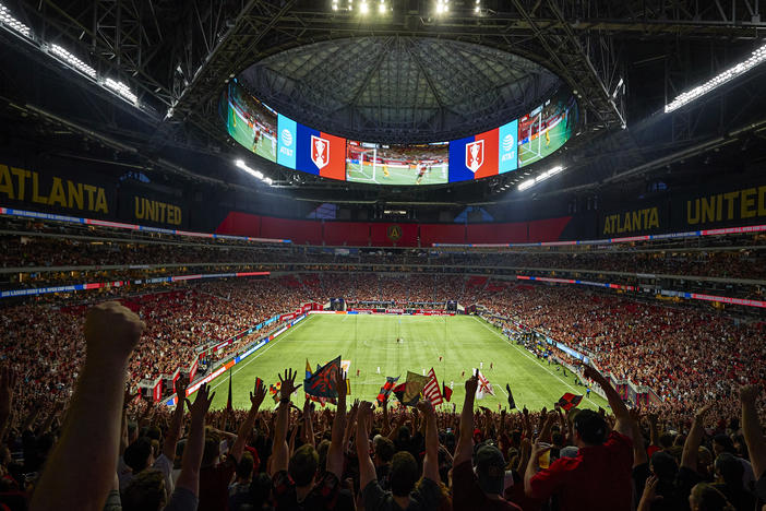 Fans of the MLS' Atlanta United wave banners at Mercedes-Benz Stadium in Atlanta, a likely venue for matches in the 2026 World Cup.