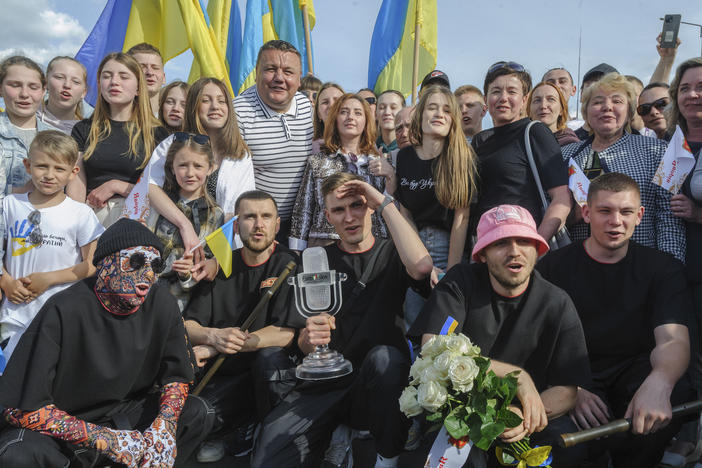 Ukraine's Kalush Orchestra, winners of the Eurovision Song Contest, pose with their trophy in Krakovets, at the Ukraine border with Poland, on May 16. The U.K., which placed second, is in talks to host next year's event instead of Ukraine due to the war.