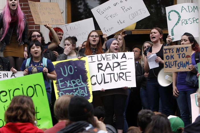 University of Oregon students and staff protest on campus in Eugene, Ore. in May of 2014, against sexual violence in the wake of allegations of rape brought against three UO basketball players by a fellow student.