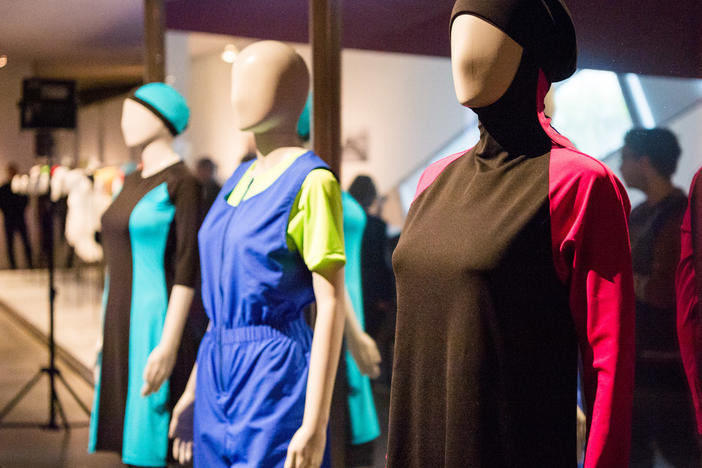 A burkini (right) and a culotte swimmer (center) are on display in the Cherchez la Femme (Look for the Woman) exhibition in the Jewish Museum in Berlin, Germany, on March 30, 2017.