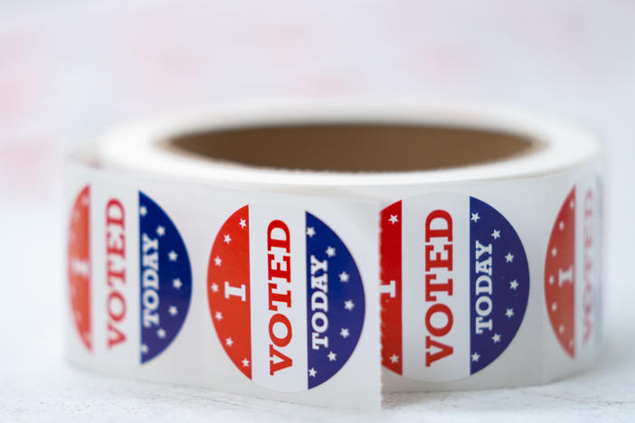 A roll of stickers reading "I voted today" sit on a table at a polling location in Summerville, S.C., during midterm primary elections on June 14, 2022.