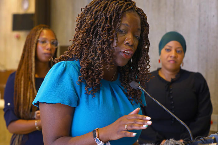 At a news conference outside the Christopher A. Iannella Chamber, Boston City Councilor Ruthzee Louijeune urges the council on June 15, 2022 to pass the resolution that the City apologize for Boston's role in the transatlantic slave trade.