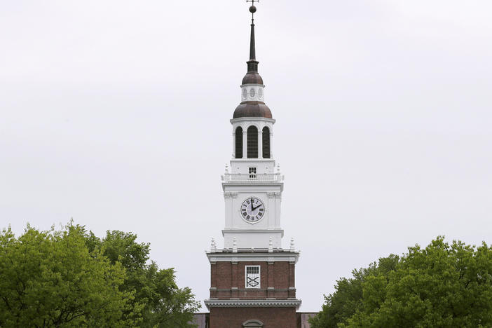 In this May 22, 2018 file photo, the spire of the Baker-Berry Library stands above The Green at Dartmouth College in Hanover, New Hampshire.