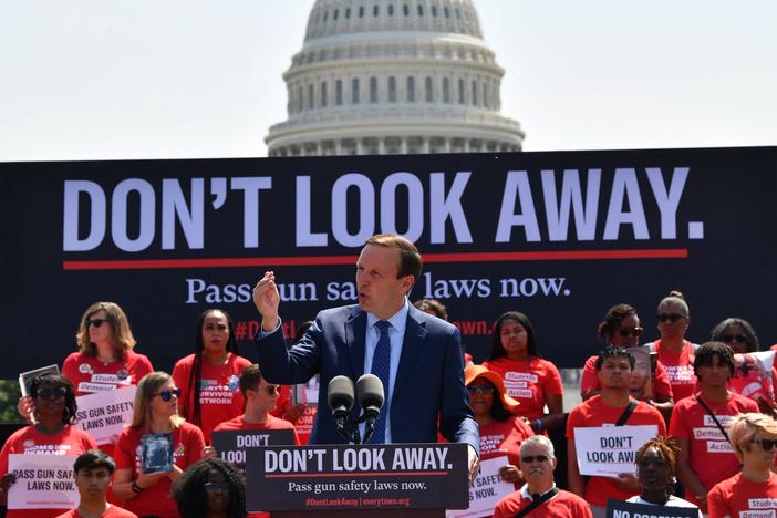 Sen. Chris Murphy of Connecticut, the lead Democratic negotiator on a bipartisan gun bill safety bill, speaks to activists protesting gun violence and demanding action from lawmakers, on June 8 near the U.S. Capitol.