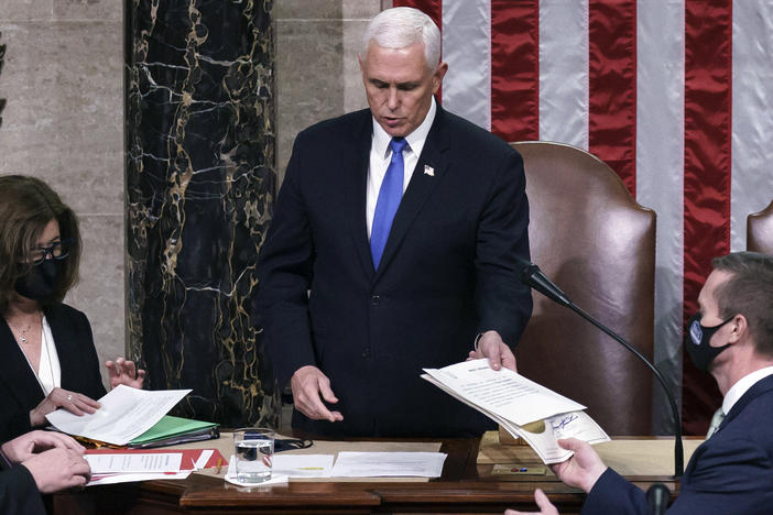 Proposed changes to the Electoral Count Act would clarify the vice president's role in counting states' electoral votes. Here, then-Vice President Mike Pence is seen in the House chamber early on Jan. 7, 2021, to finish the work of the Electoral College after a mob loyal to President Donald Trump stormed the Capitol.
